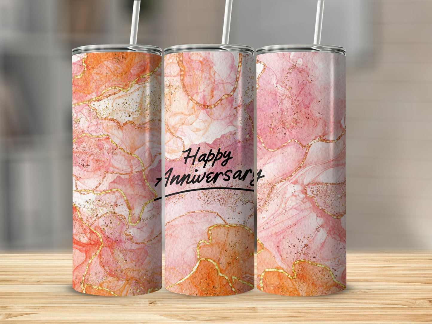 Pink and orange marble tumbler with gold accents and "Happy Anniversary" text.