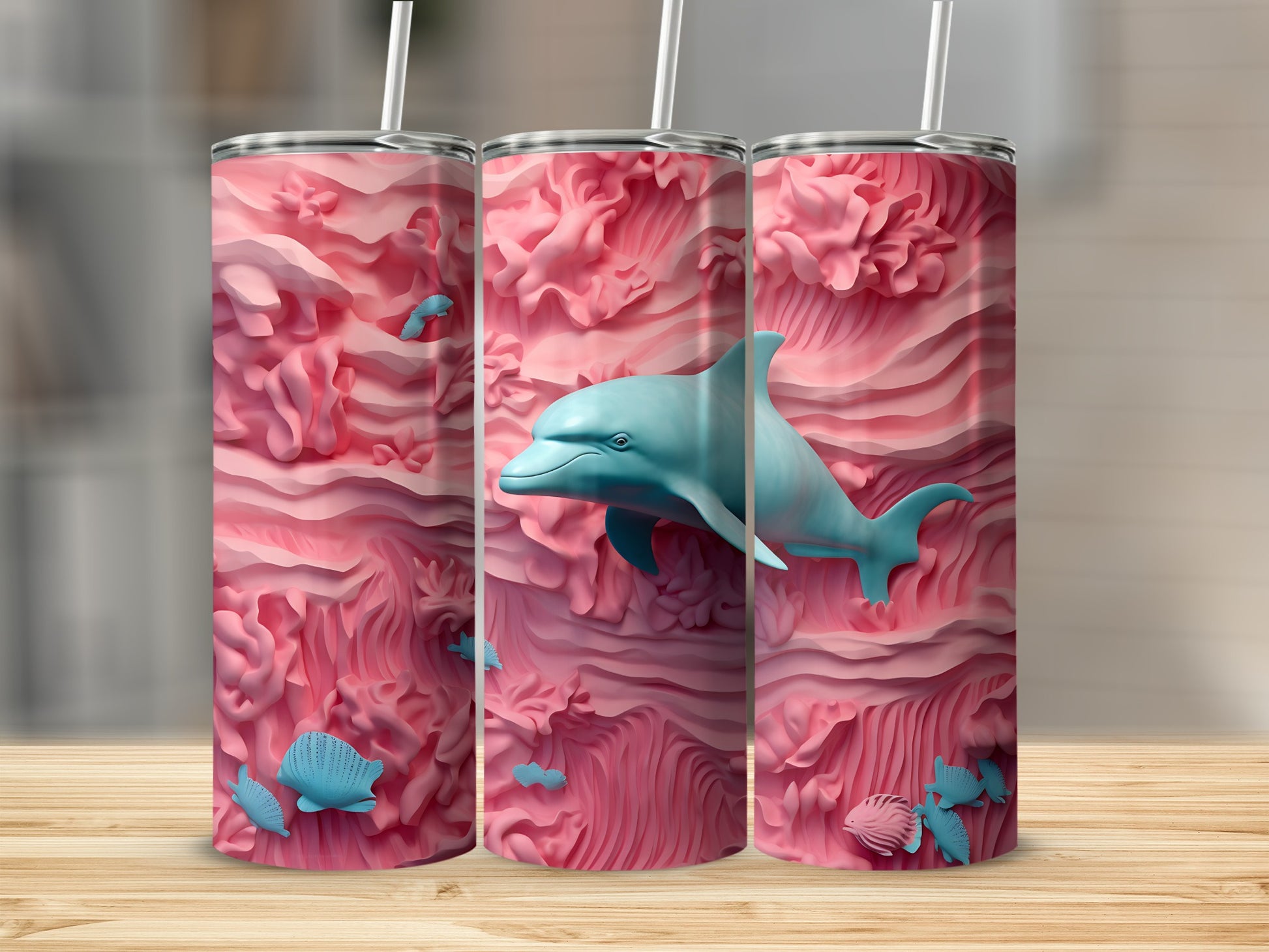 Pink coral reef tumbler with teal dolphin and shells.