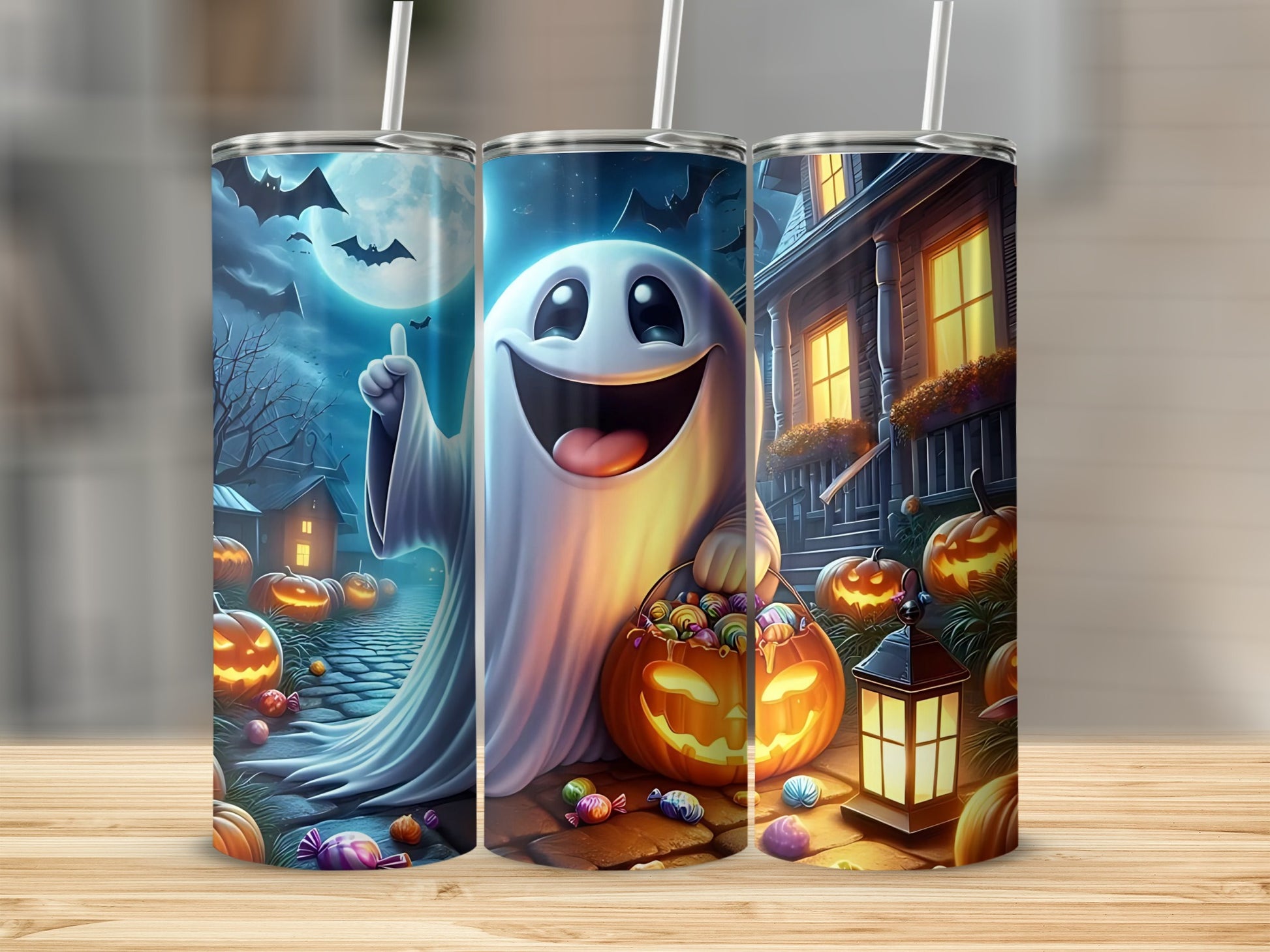 Halloween tumblers with ghosts, pumpkins, bats, and candy.