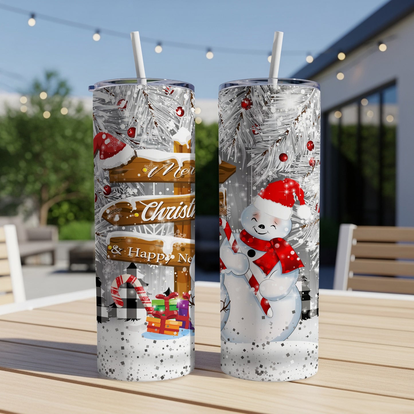 Snowman with "Merry Christmas" sign on a winter-themed tumbler.