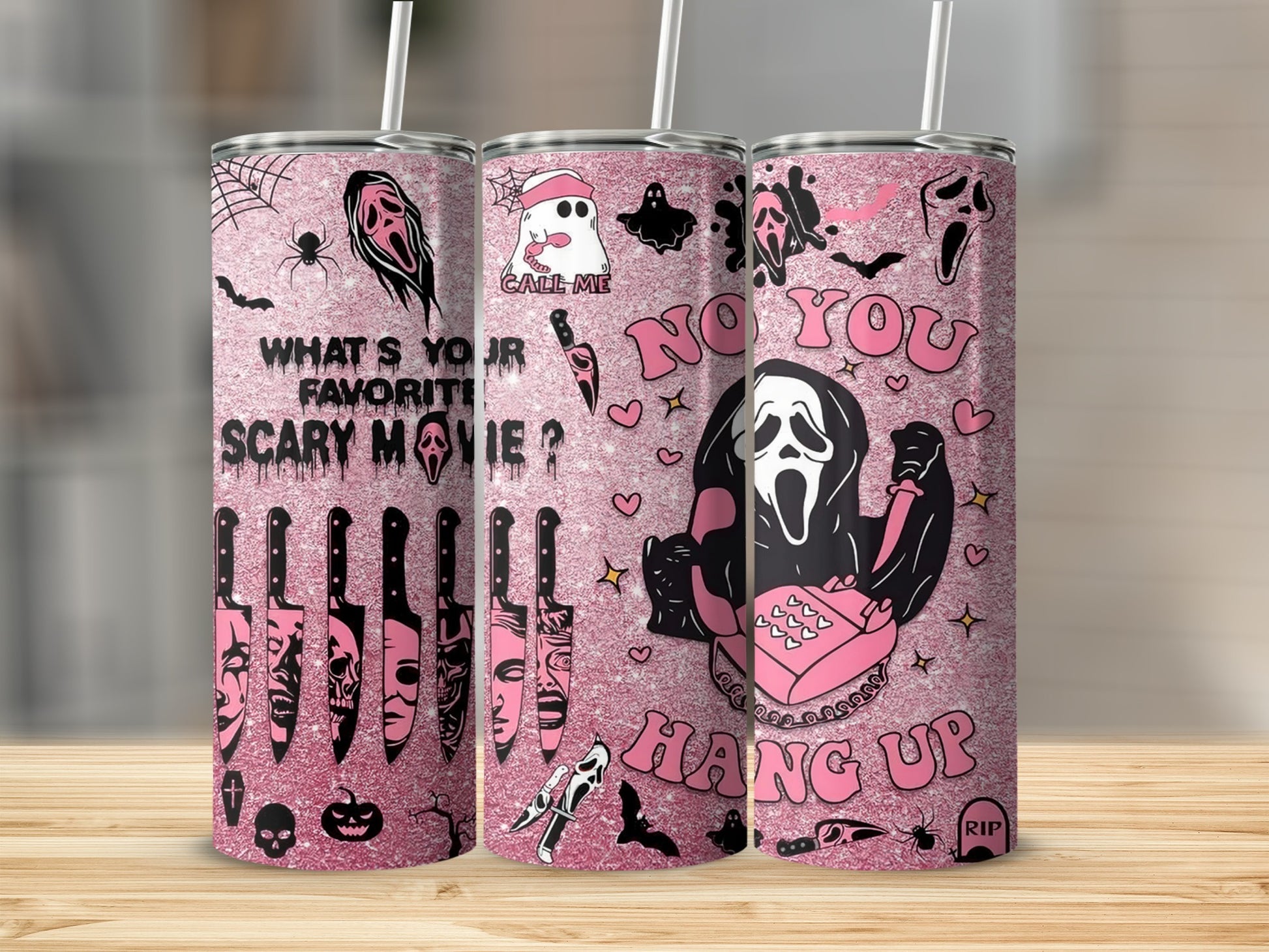 Pink glitter tumblers with ghost and horror movie knife designs.
