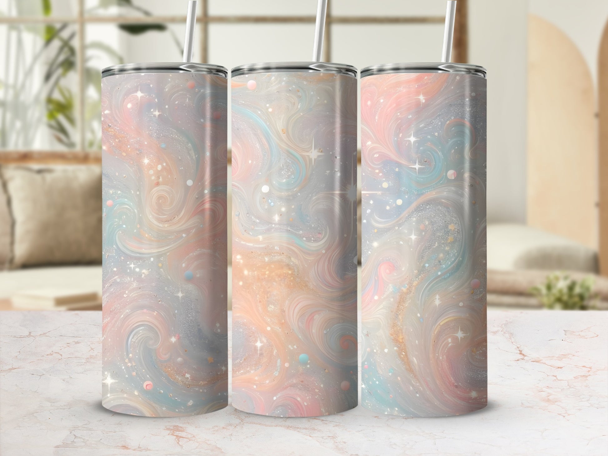 Three tumblers with pastel watercolor swirls and glitter.