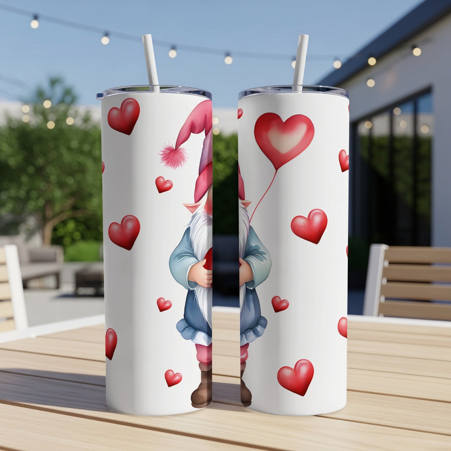 Two tall tumblers with a gnome and hearts design.