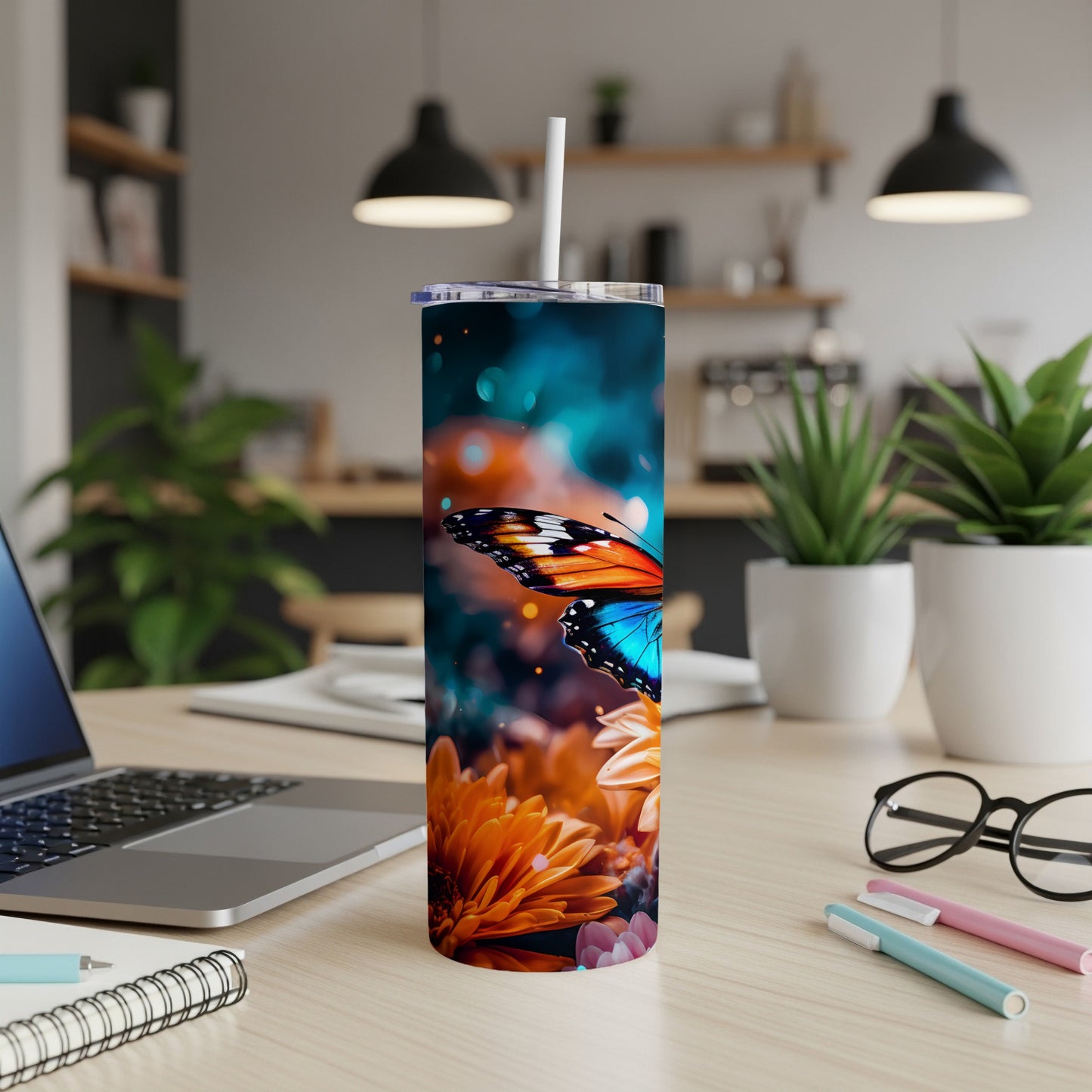 Tall tumbler with a close-up butterfly and floral design.