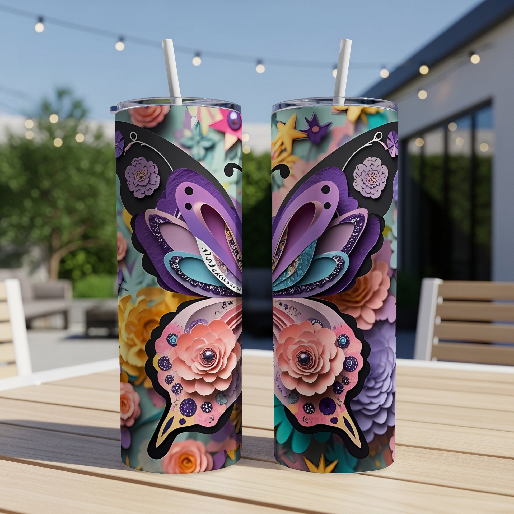 Two tumblers featuring a colorful butterfly and floral design with straws.