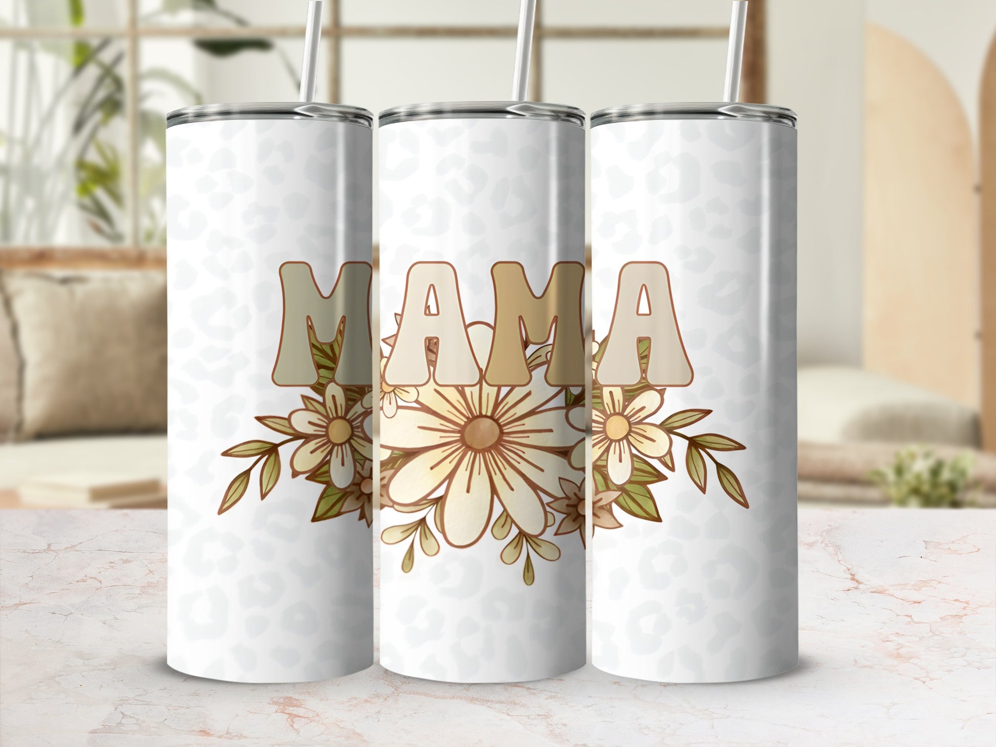White tumbler with "MAMA" in beige letters and floral accents.