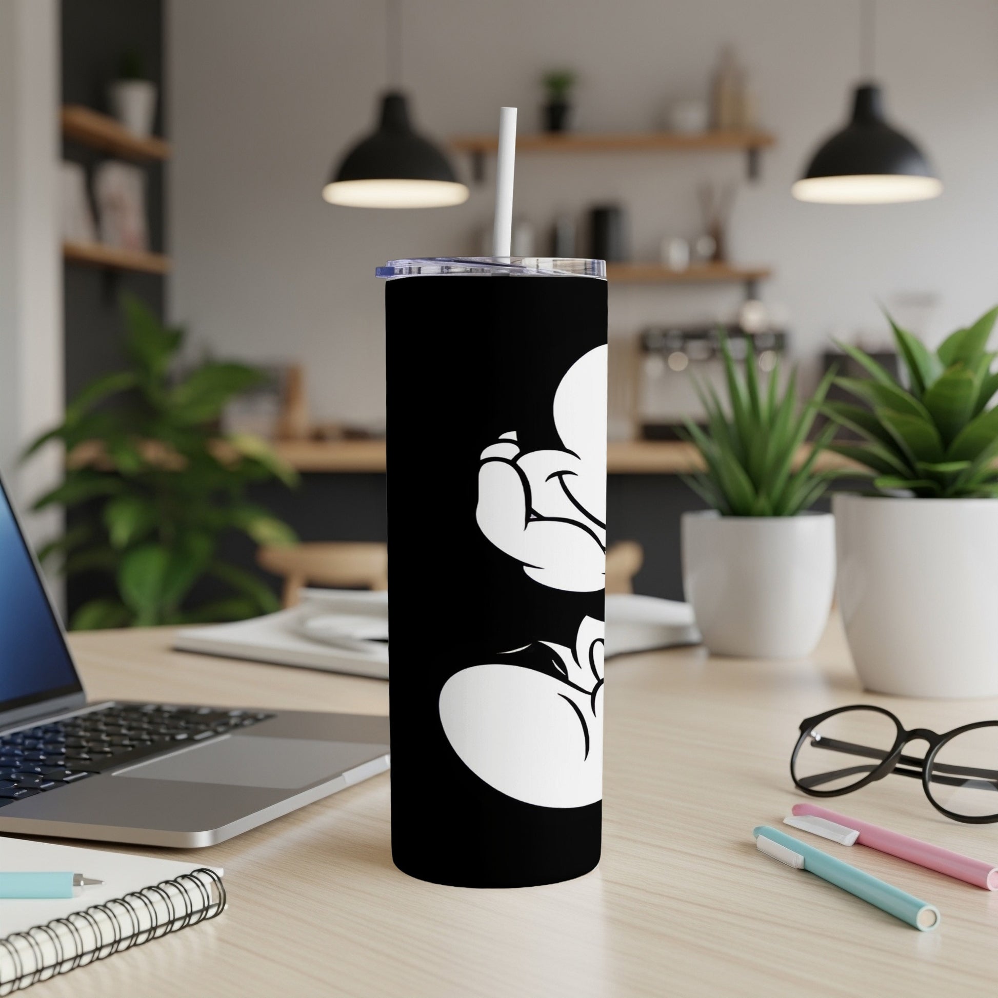 Black tumbler featuring a white Mickey Mouse glove design.