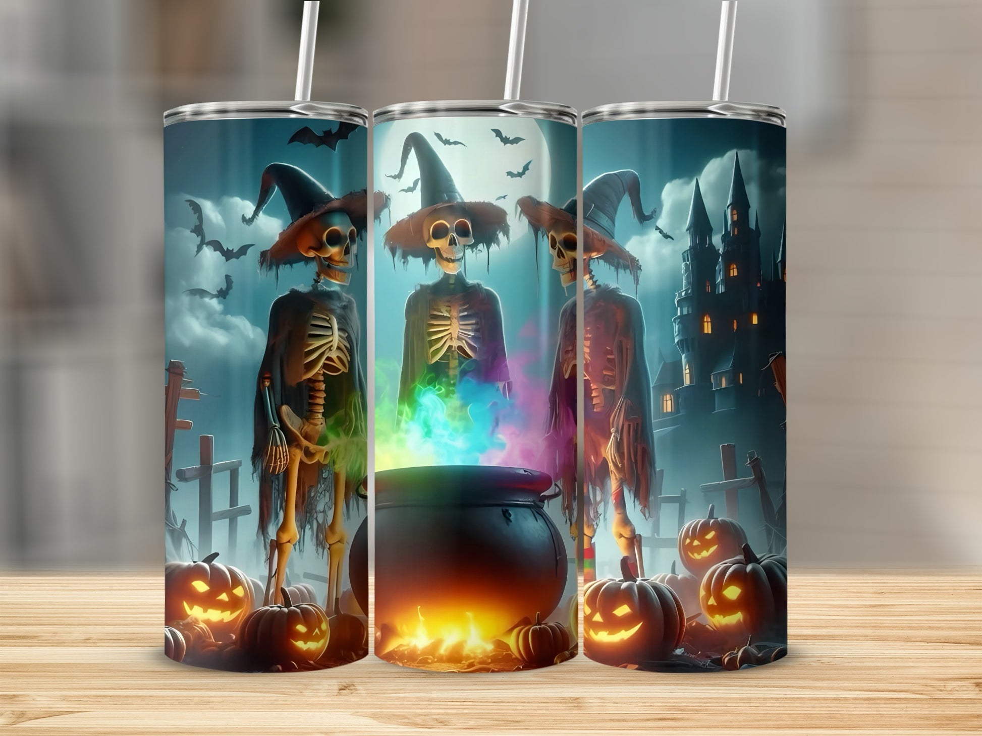 Three tumblers with Halloween skeleton and cauldron designs under a spooky moonlit sky.