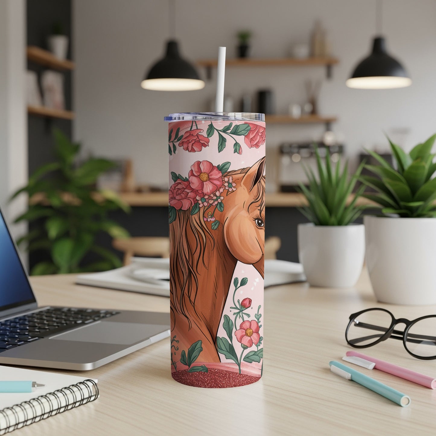 Horse and floral pattern on a pink skinny tumbler with a straw.