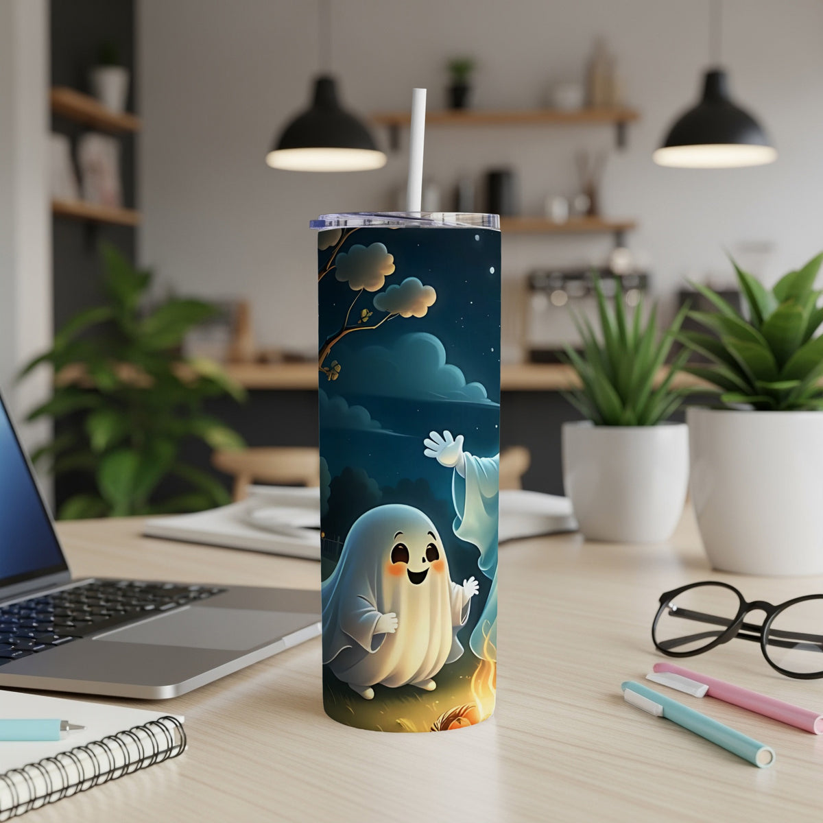 Tumbler with cartoon ghosts, campfire, and pumpkins on a dark starry night.