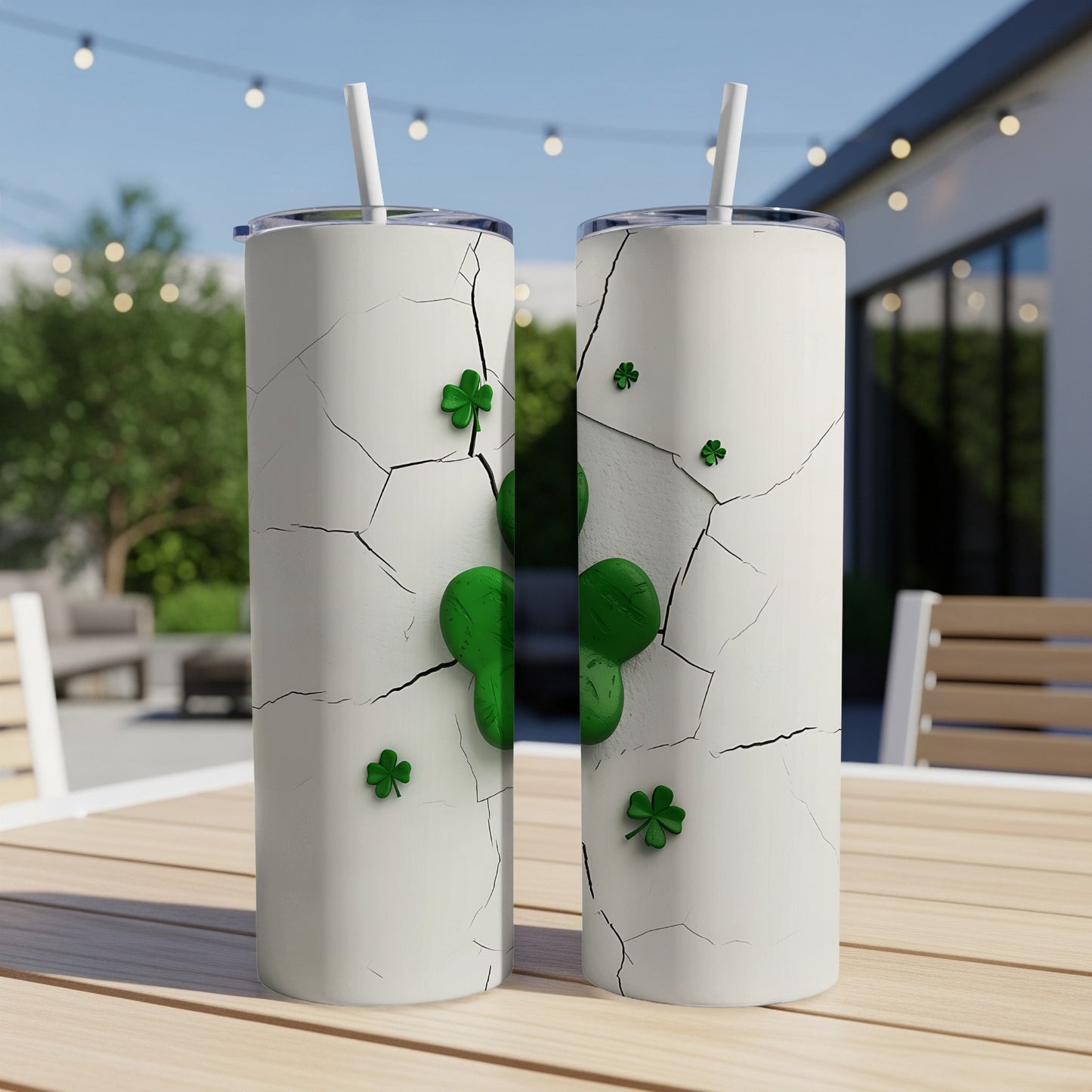 White tumblers with shamrock designs and cracked texture.
