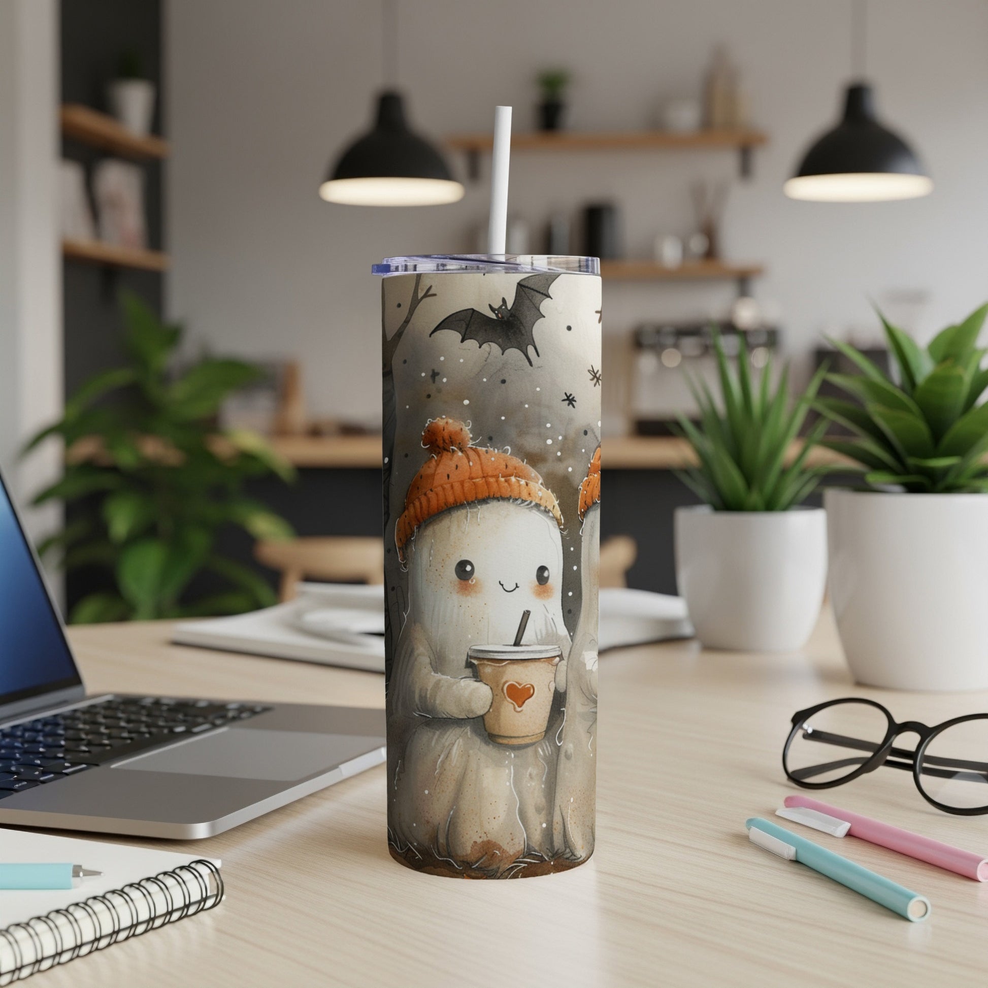 Ghost wearing a beanie holding a coffee cup on a Halloween themed tumbler.