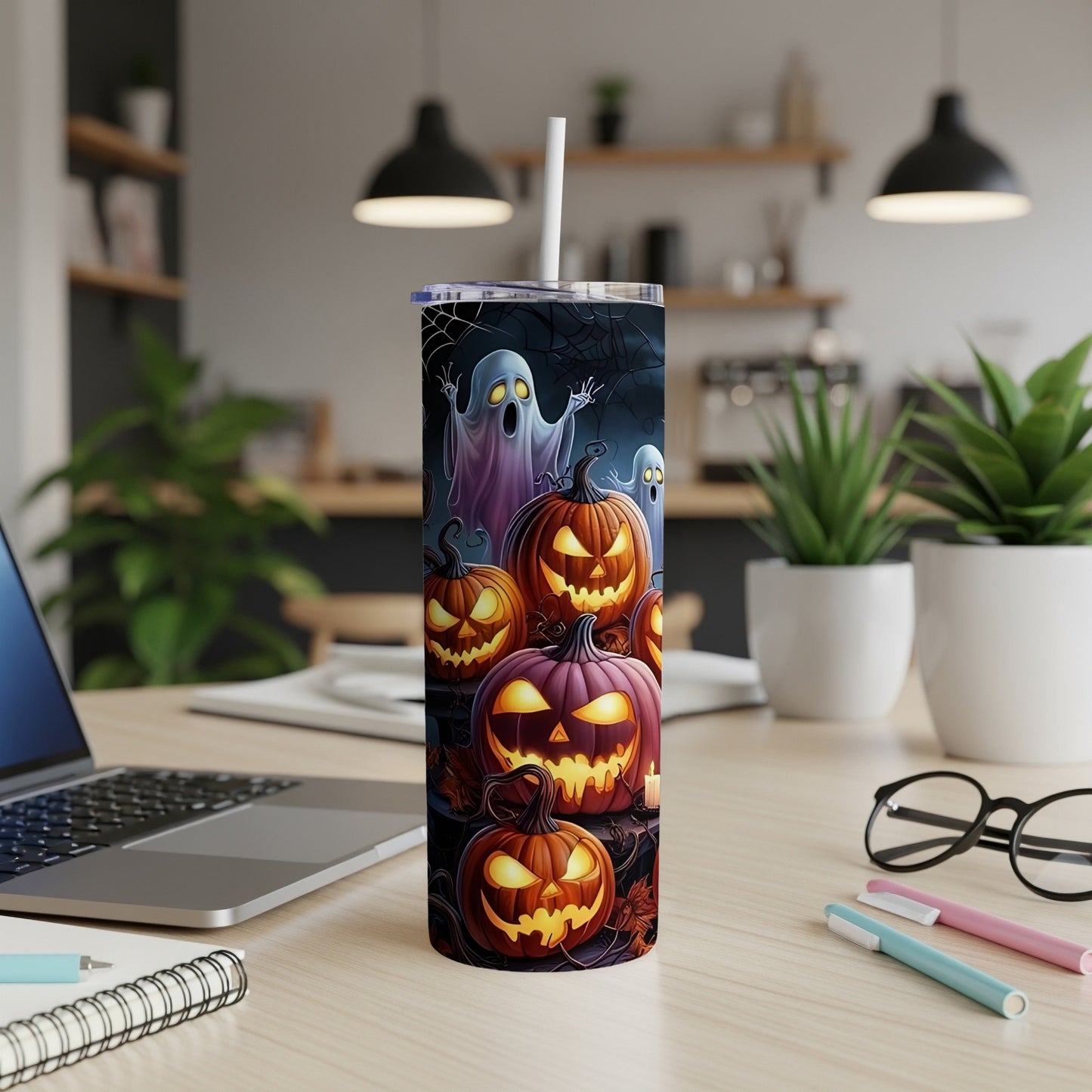 Halloween tumbler with spooky ghosts and jack-o'-lanterns design.