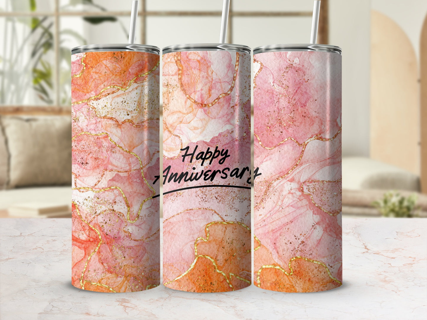 Pink and orange marble tumbler with "Happy Anniversary" text.