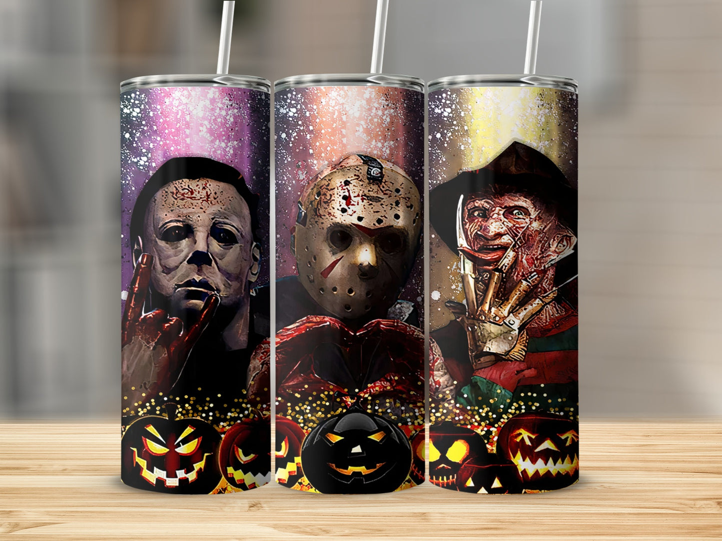 Three Halloween-themed tumblers featuring horror movie villains Michael Myers, Jason Voorhees, and Freddy Krueger.