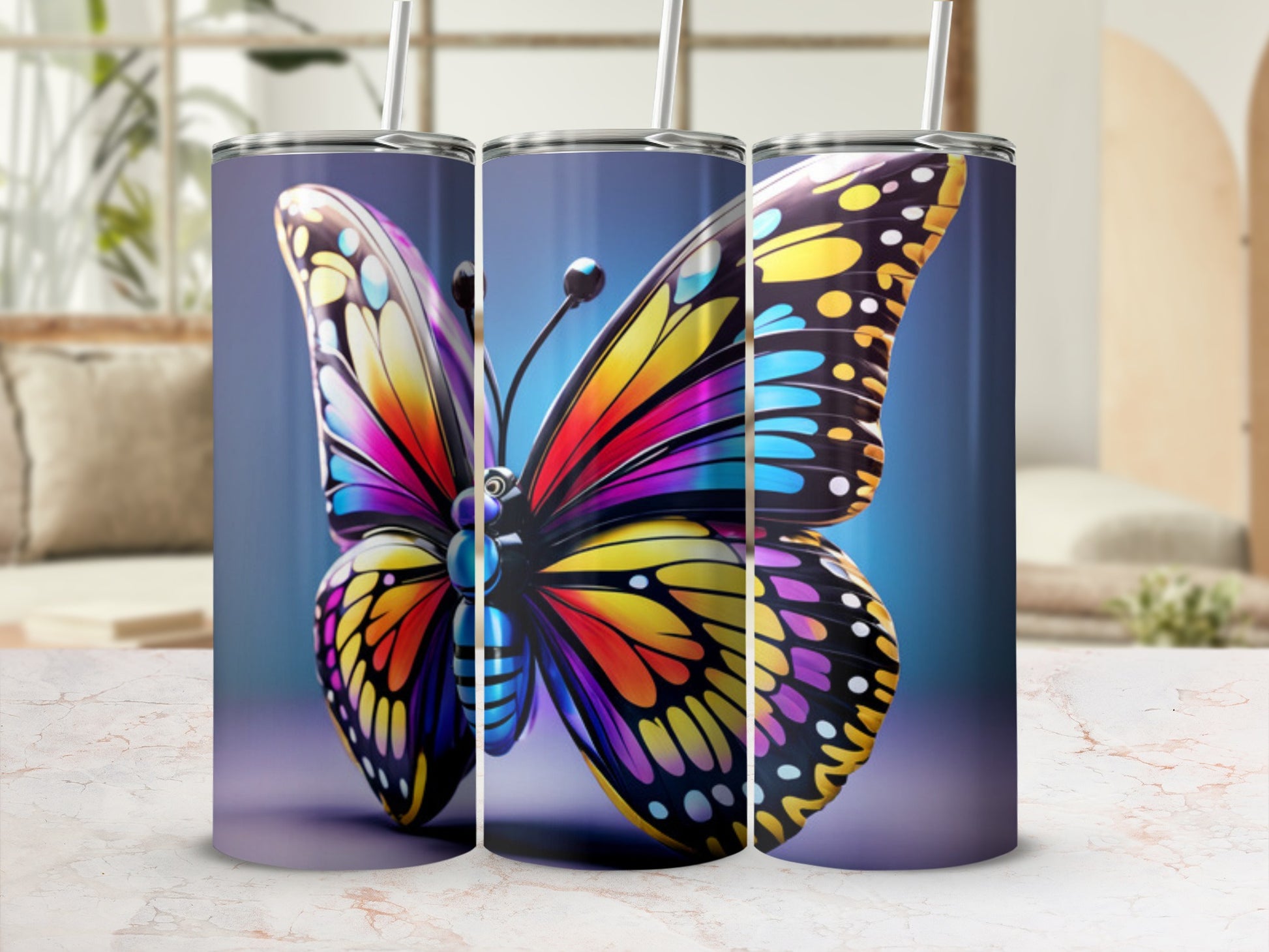 Colorful butterfly design on three adjacent tumblers.