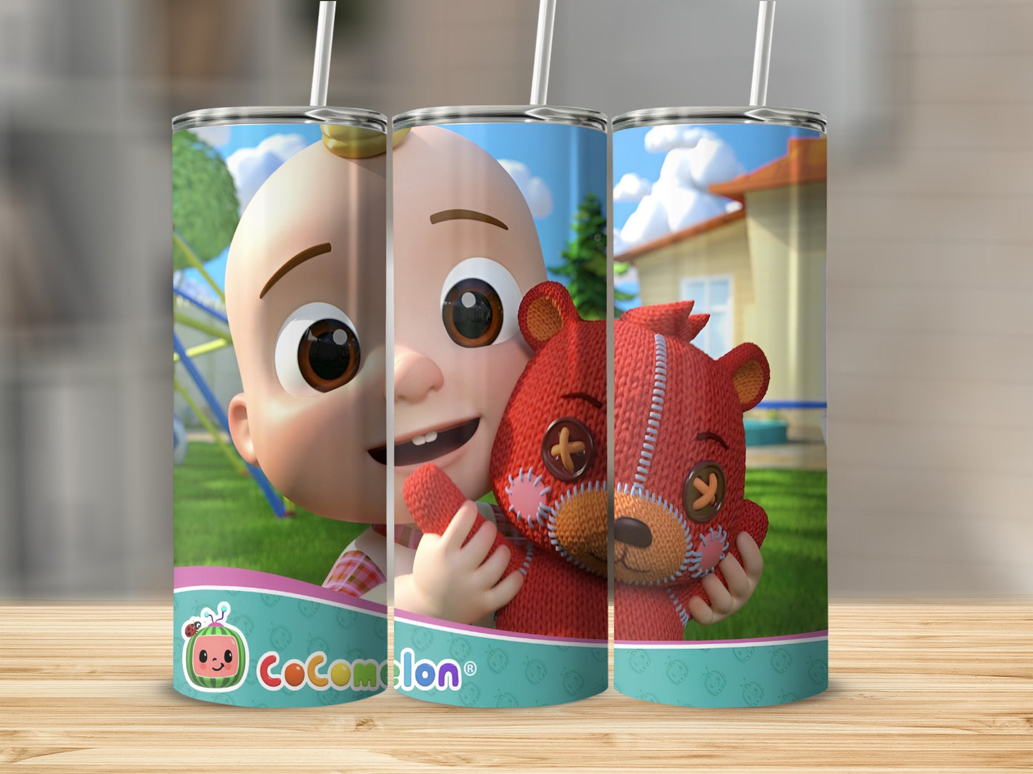 Cocomelon JJ hugging a red teddy bear on a tumbler.
