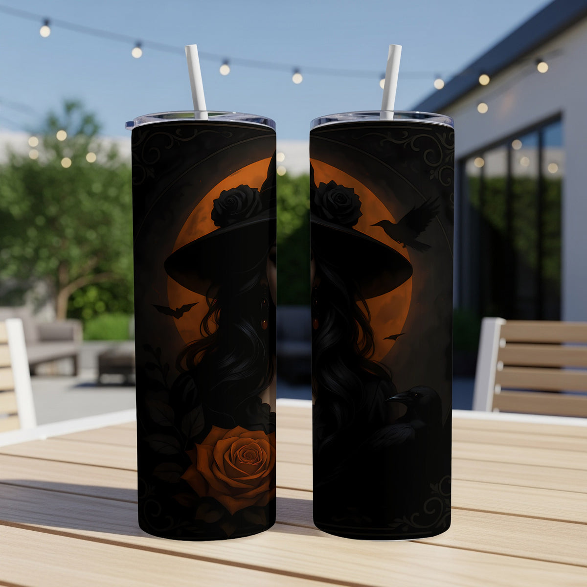 Two tumblers with witch and raven Halloween themed art, featuring black roses.