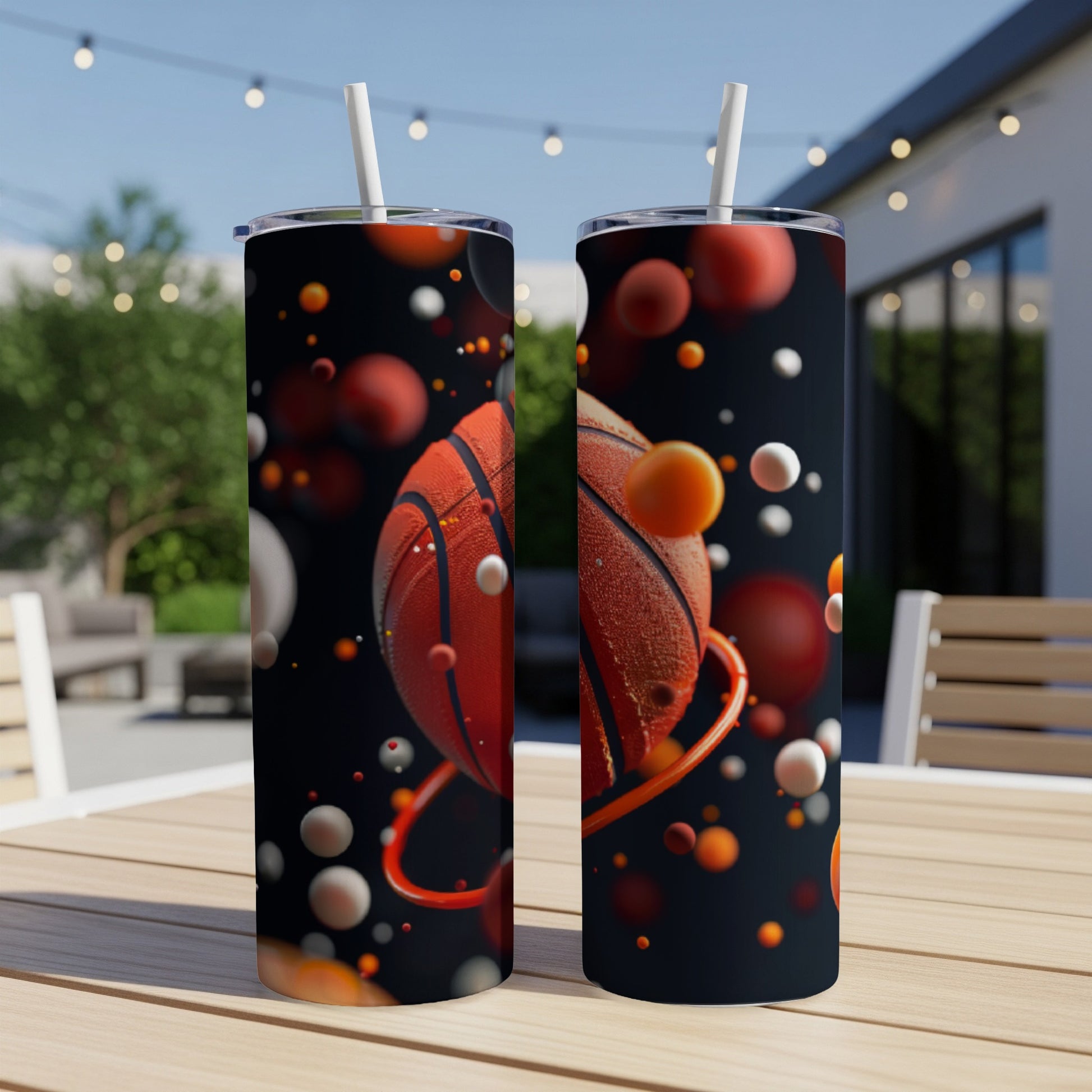 Two tumblers with basketballs and spheres floating on a dark background.