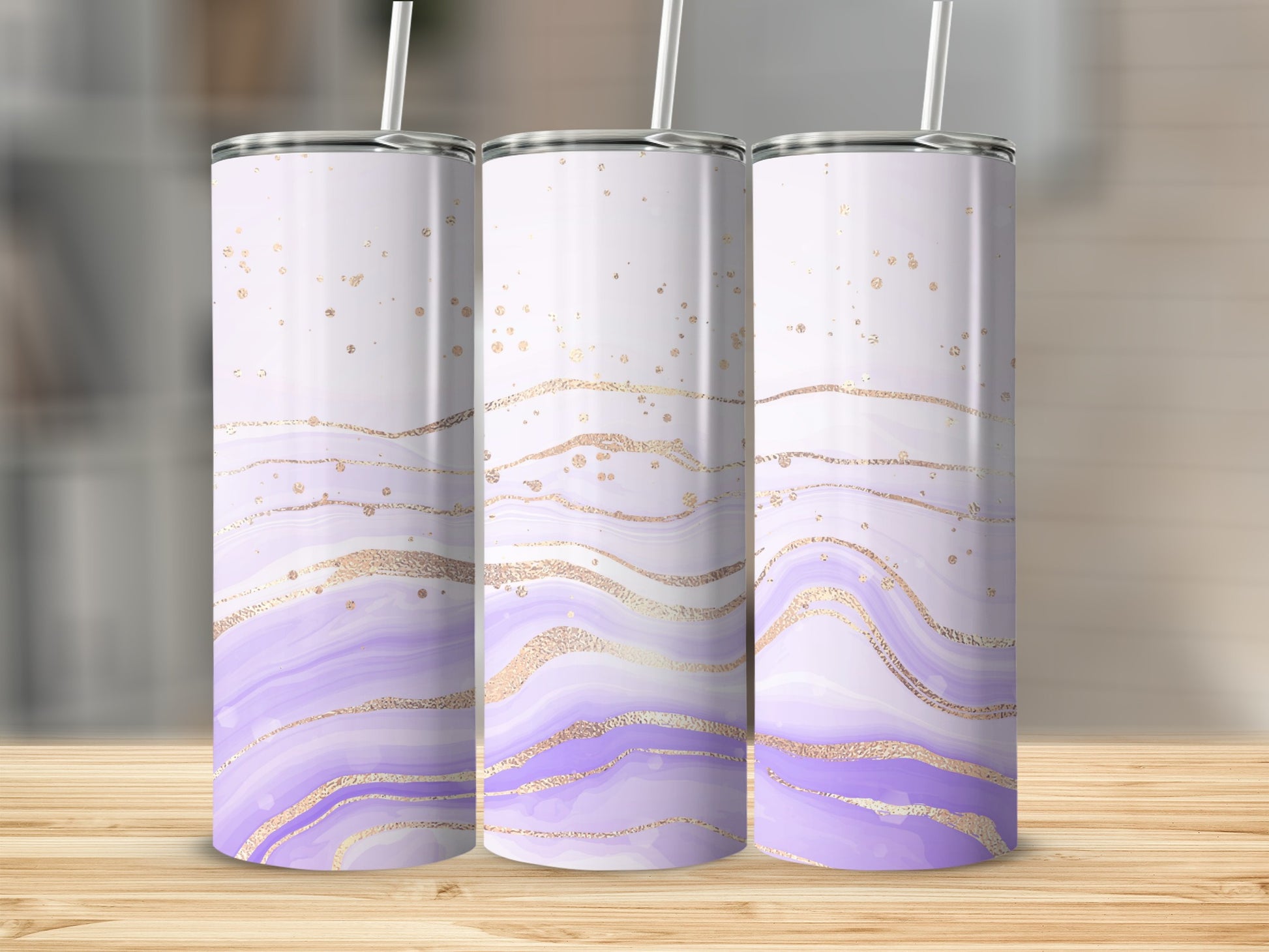 Three tumblers with marbled purple and gold abstract design.