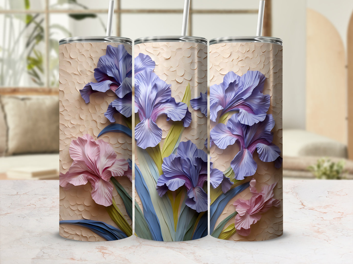 Three tumblers with purple and pink iris flowers against a textured background.