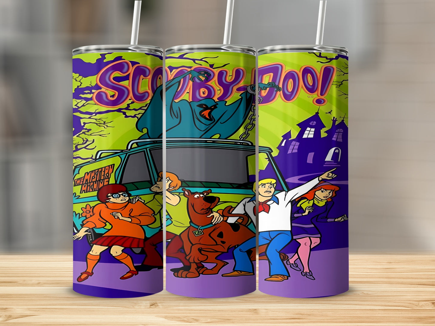 Scooby-Doo characters and Mystery Machine on a purple and green patterned tumbler.