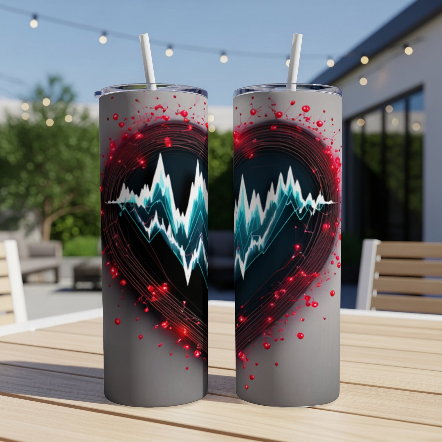 Two tall, gray tumblers with a heart and EKG design.