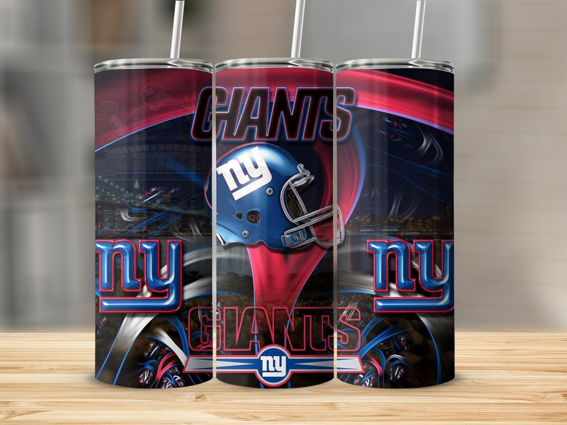 Three New York Giants tumblers featuring the team's helmet, logo, and "Giants" text.
