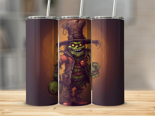 Green zombie scarecrow with pumpkin bag and Halloween pumpkin button on tumbler.