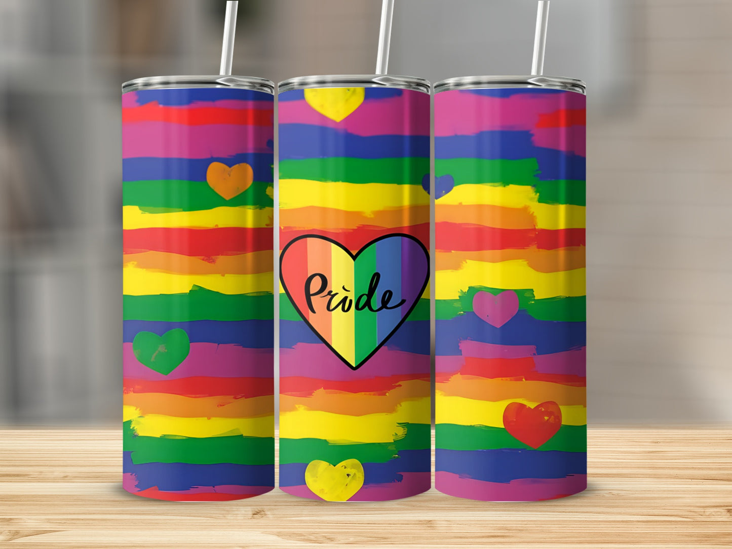 Rainbow pride tumbler with heart graphic and "Pride" text.