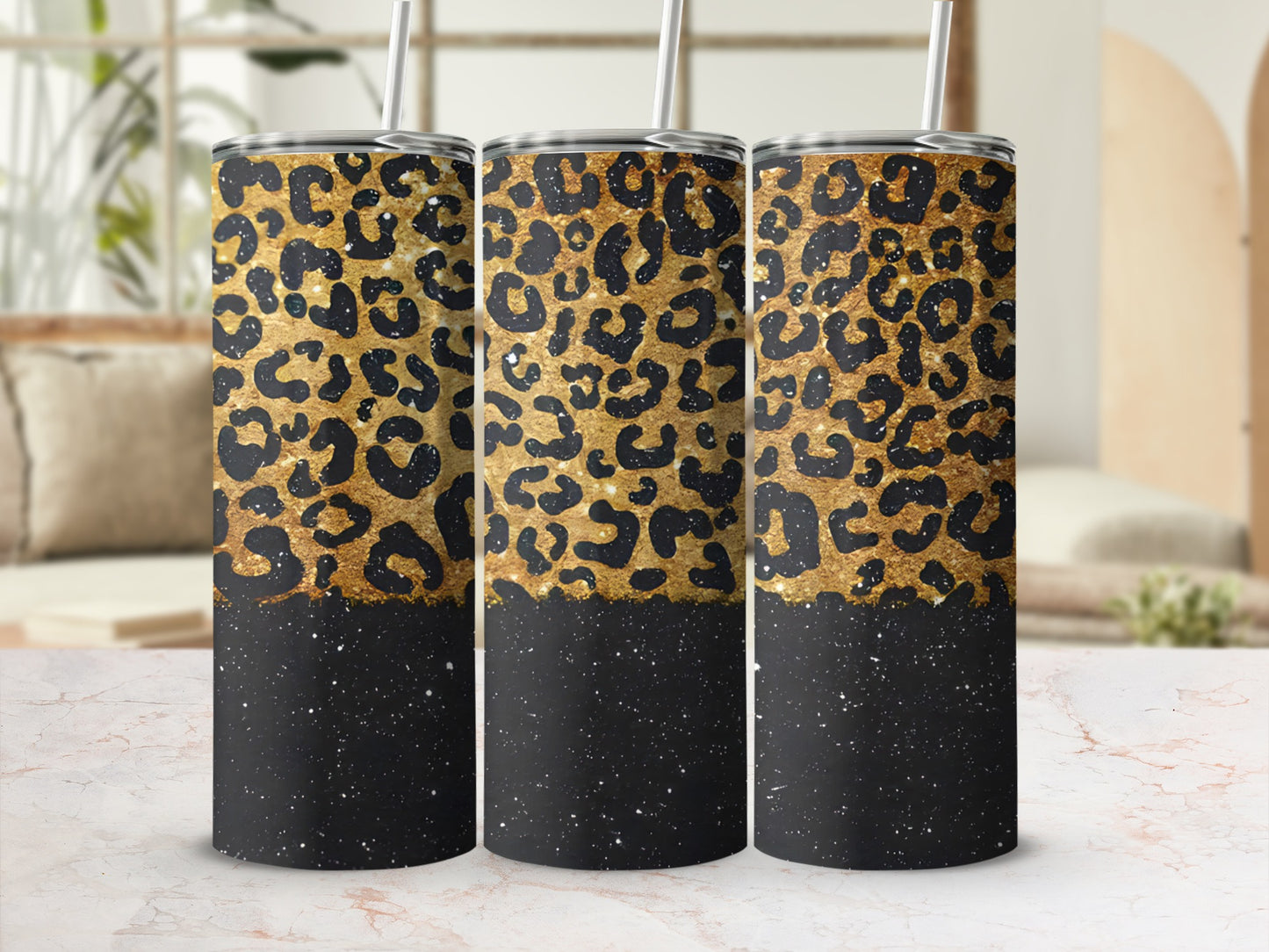 Three tumblers with leopard print and black speckled lower halves.