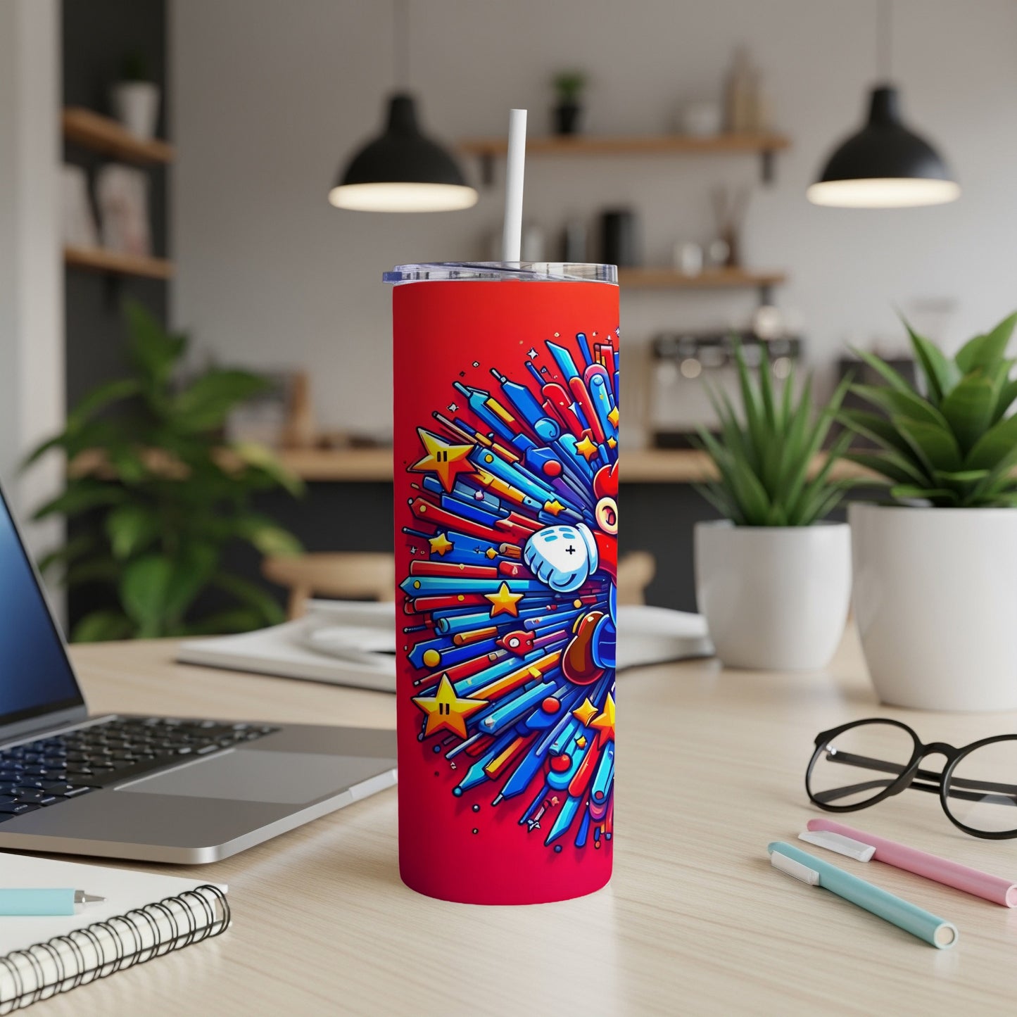 Red tumbler with cartoon fireworks, stars, and a smiling character.