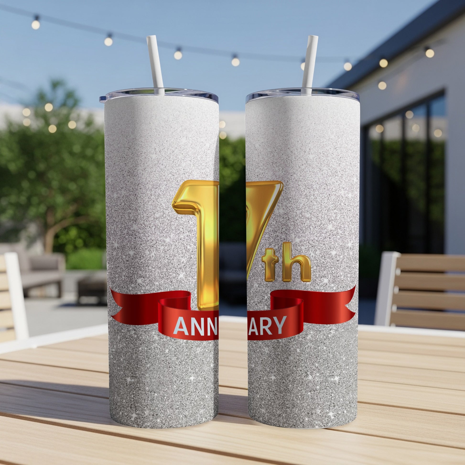 Two silver glitter tumblers with "17th Anniversary" text and a red ribbon.