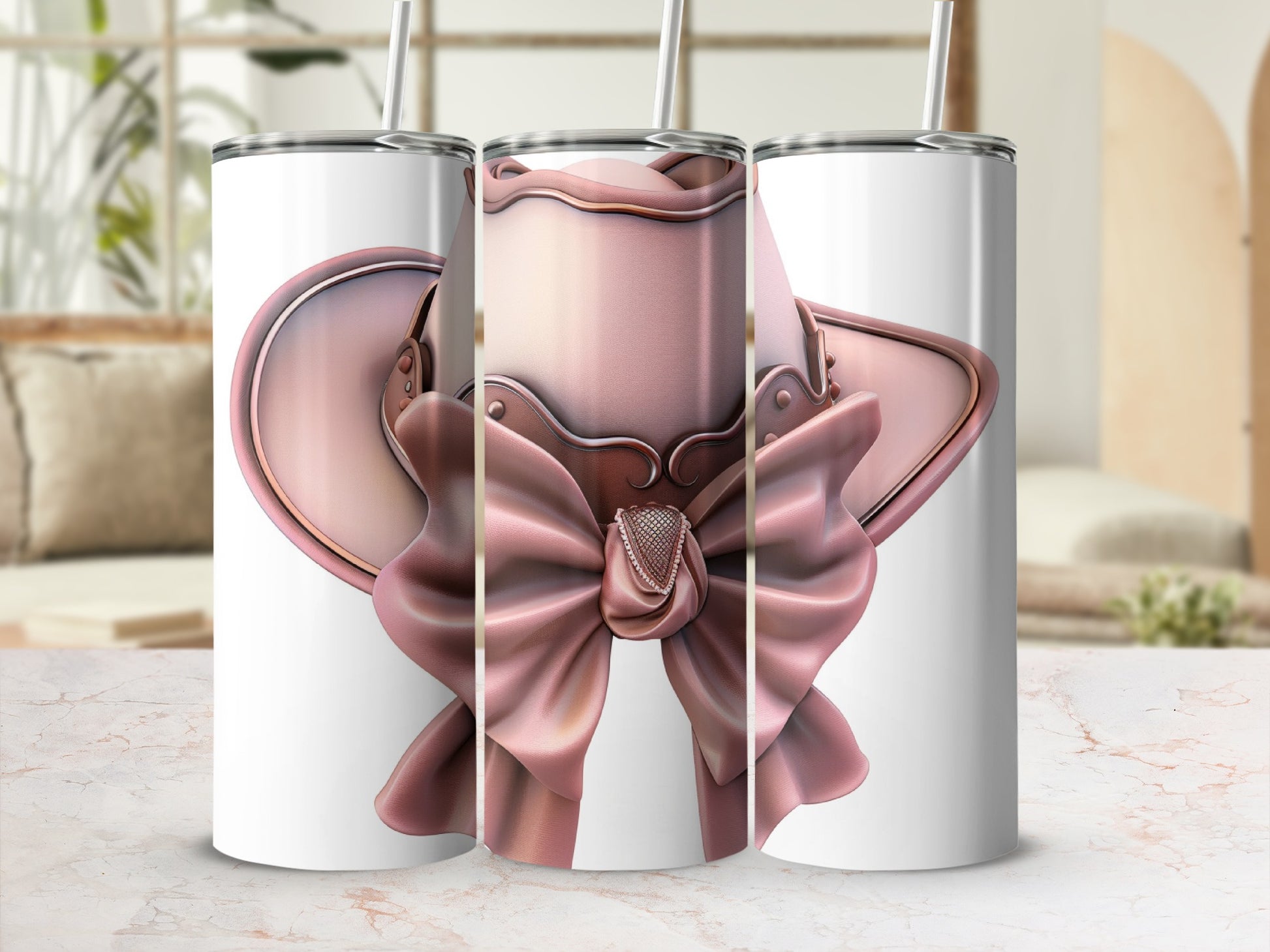 Pink bow and decorative trim on three white tumblers.