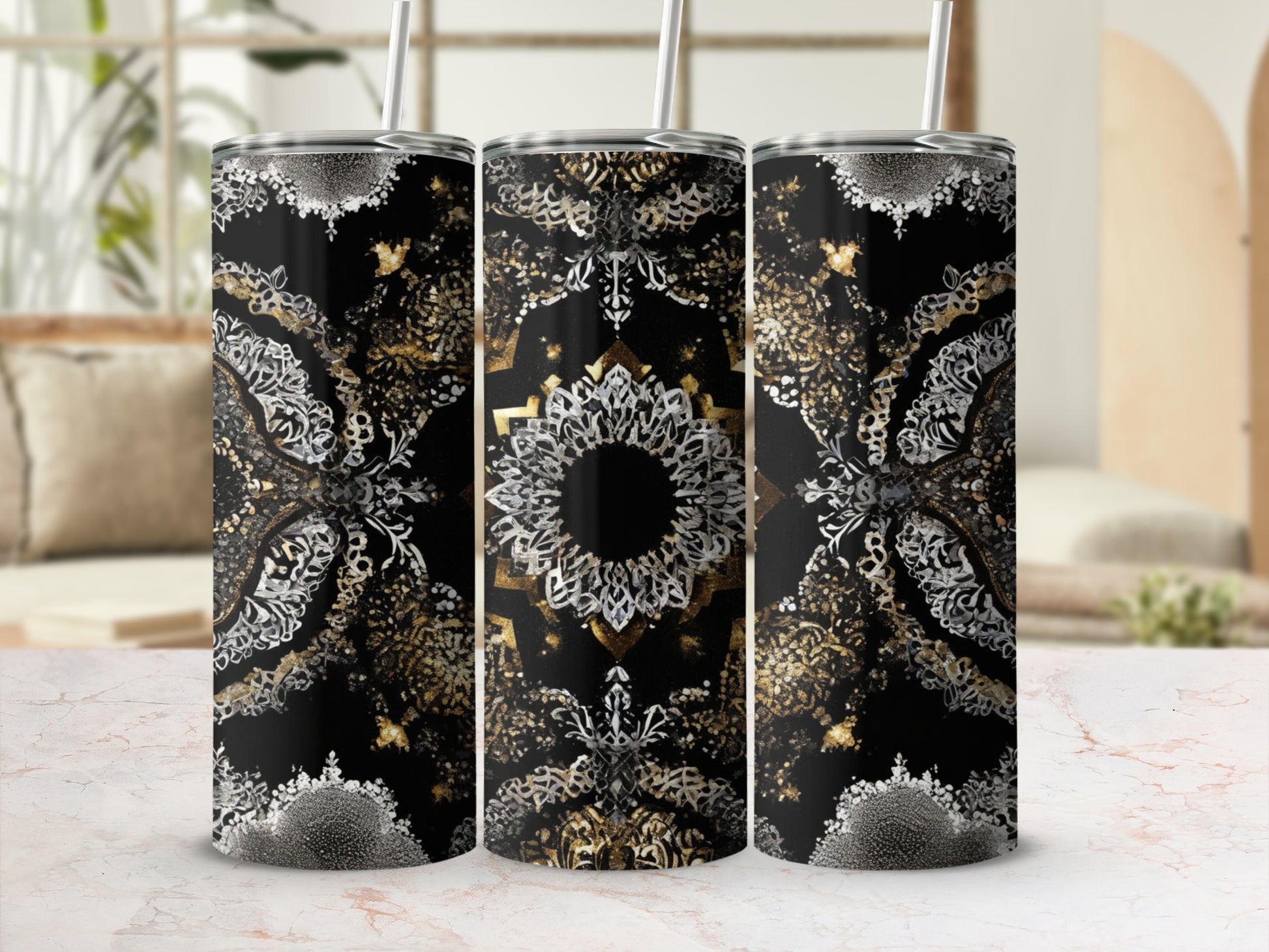 Black tumbler with gold and white mandala pattern.