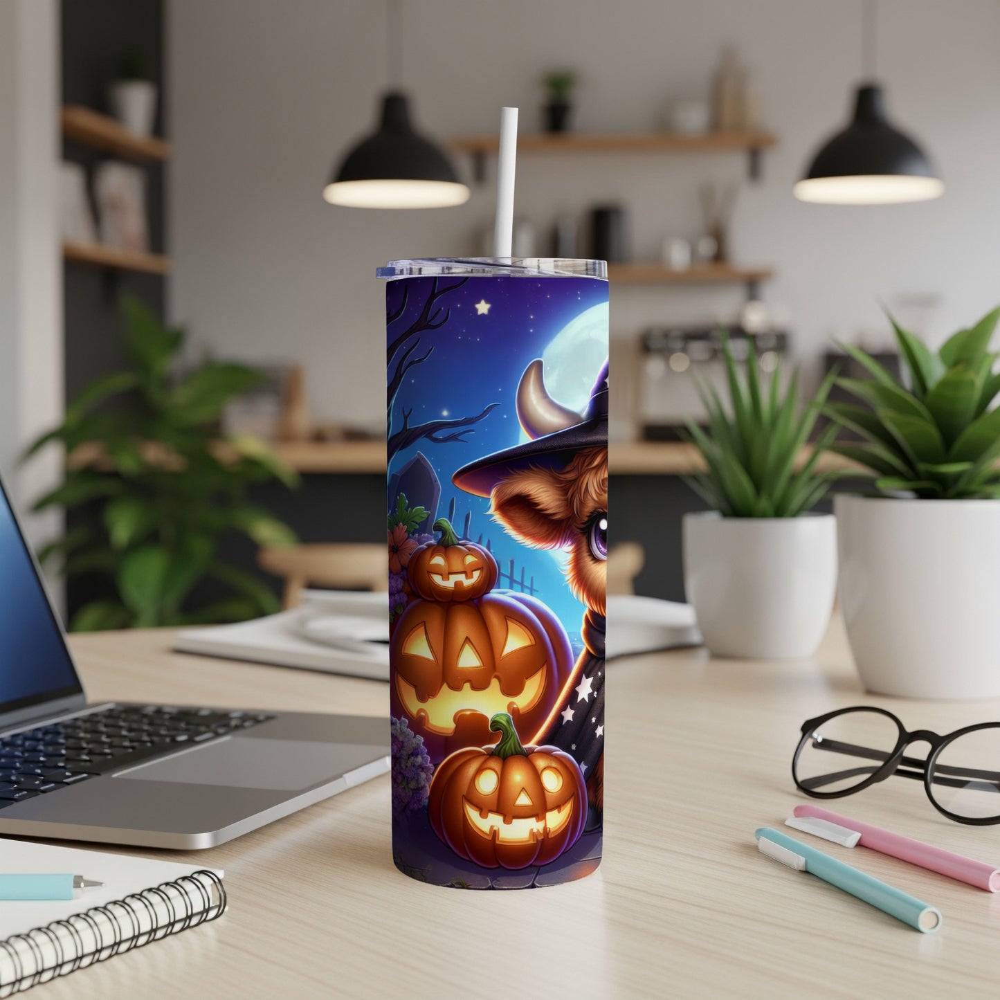 Cow character in witch hat with pumpkins and moon, on a tumbler.