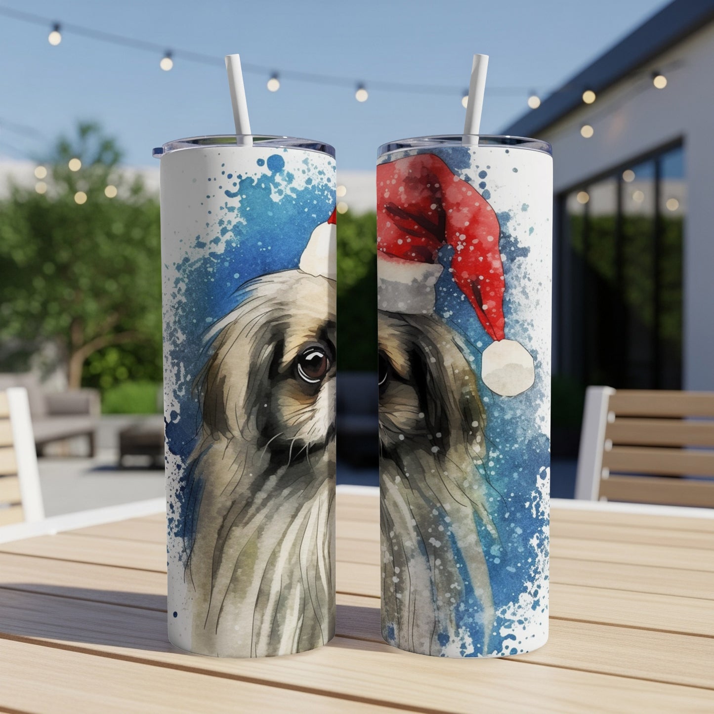 Two tumblers featuring a watercolor painting of a dog wearing a Santa hat.