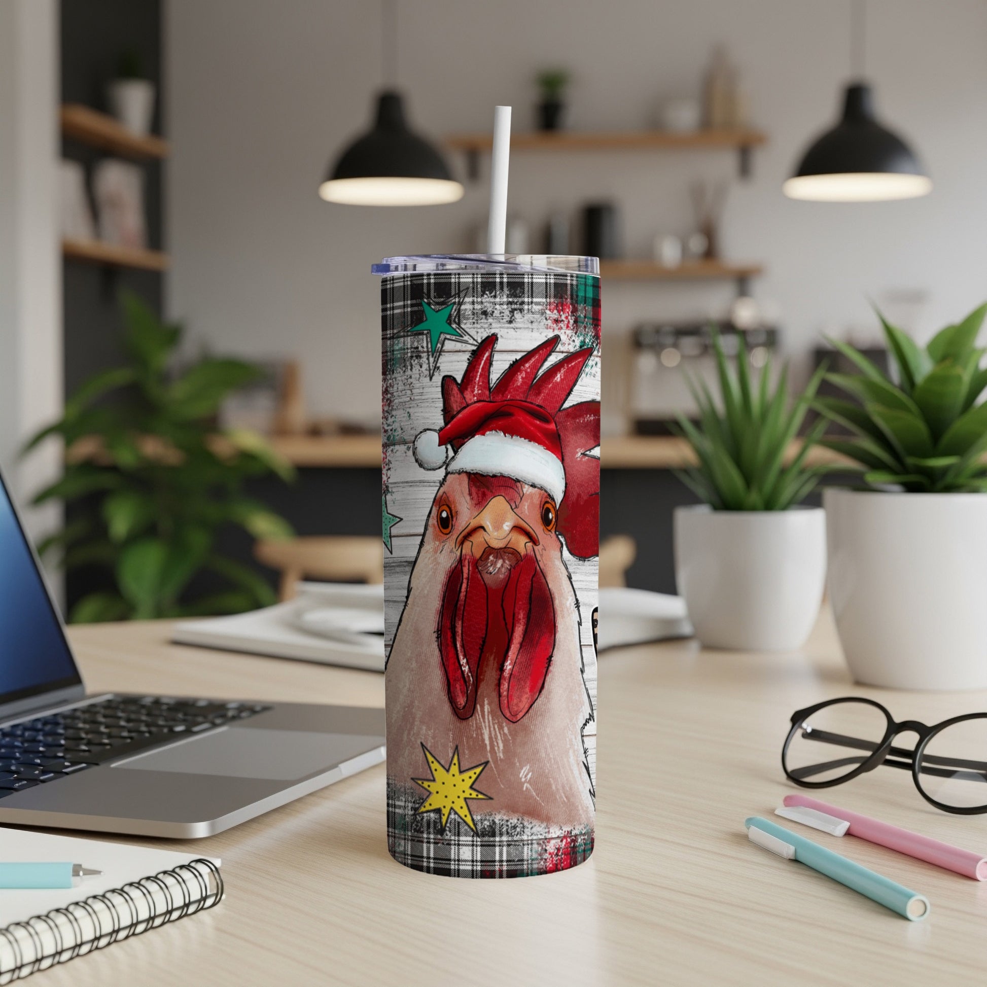 Santa hat rooster on plaid tumbler with festive stars.