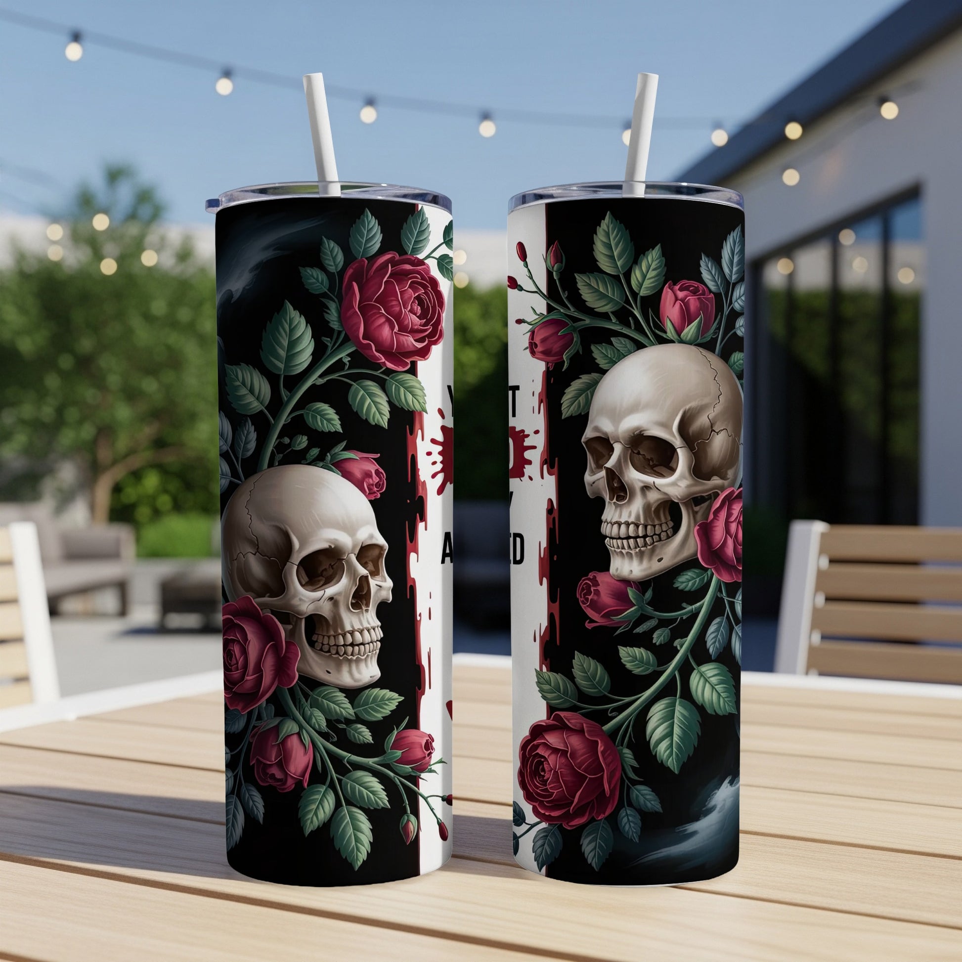 Two tumblers with skulls and red roses on a dark background.