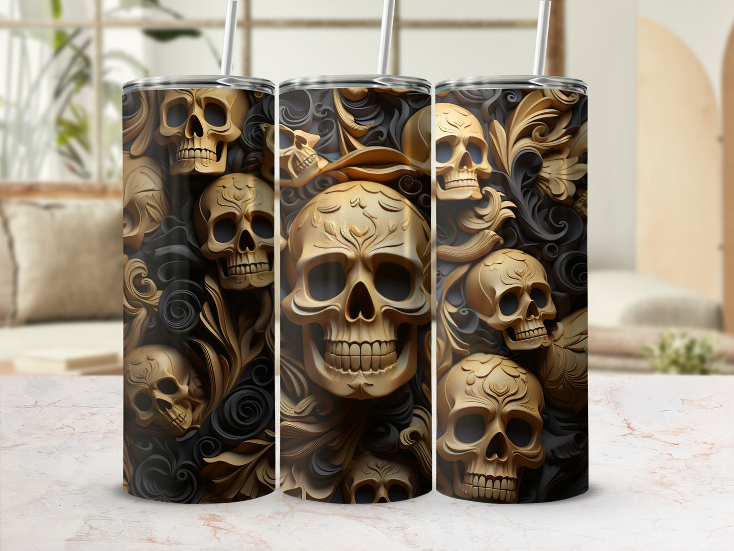 Gold skulls and ornate patterns on a black background, three tumblers shown.