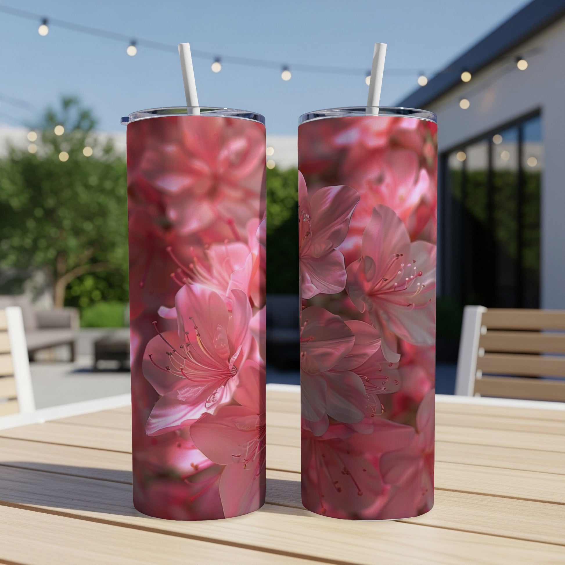 Two tall tumblers with a close-up floral pink azalea pattern.