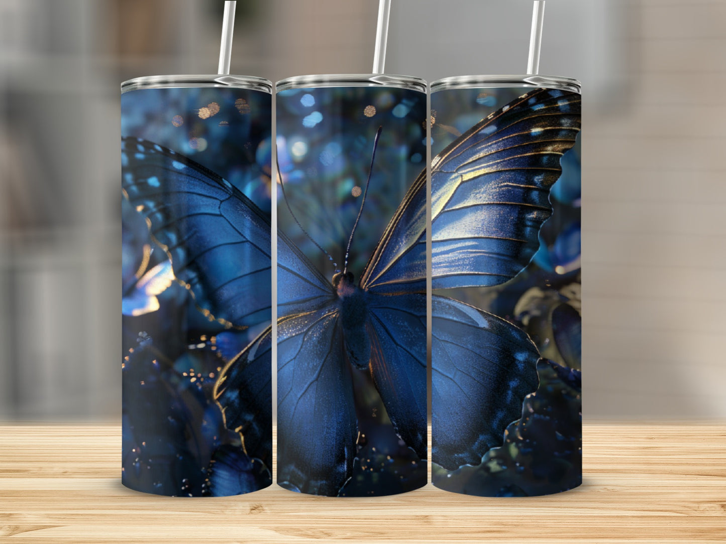 Three tumblers featuring a detailed, close-up blue morpho butterfly with bokeh lighting.