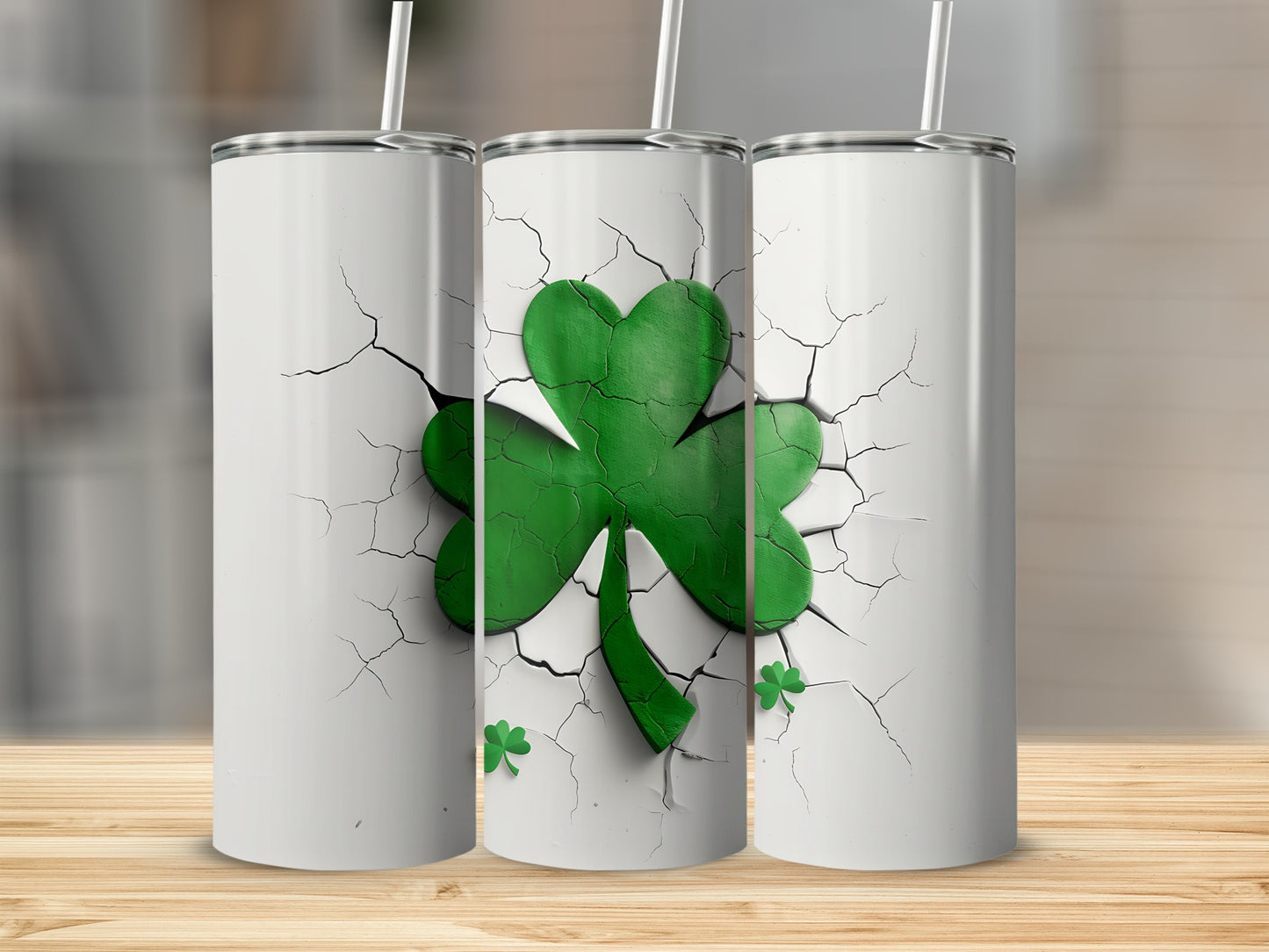 White tumbler with cracked design and a green shamrock.