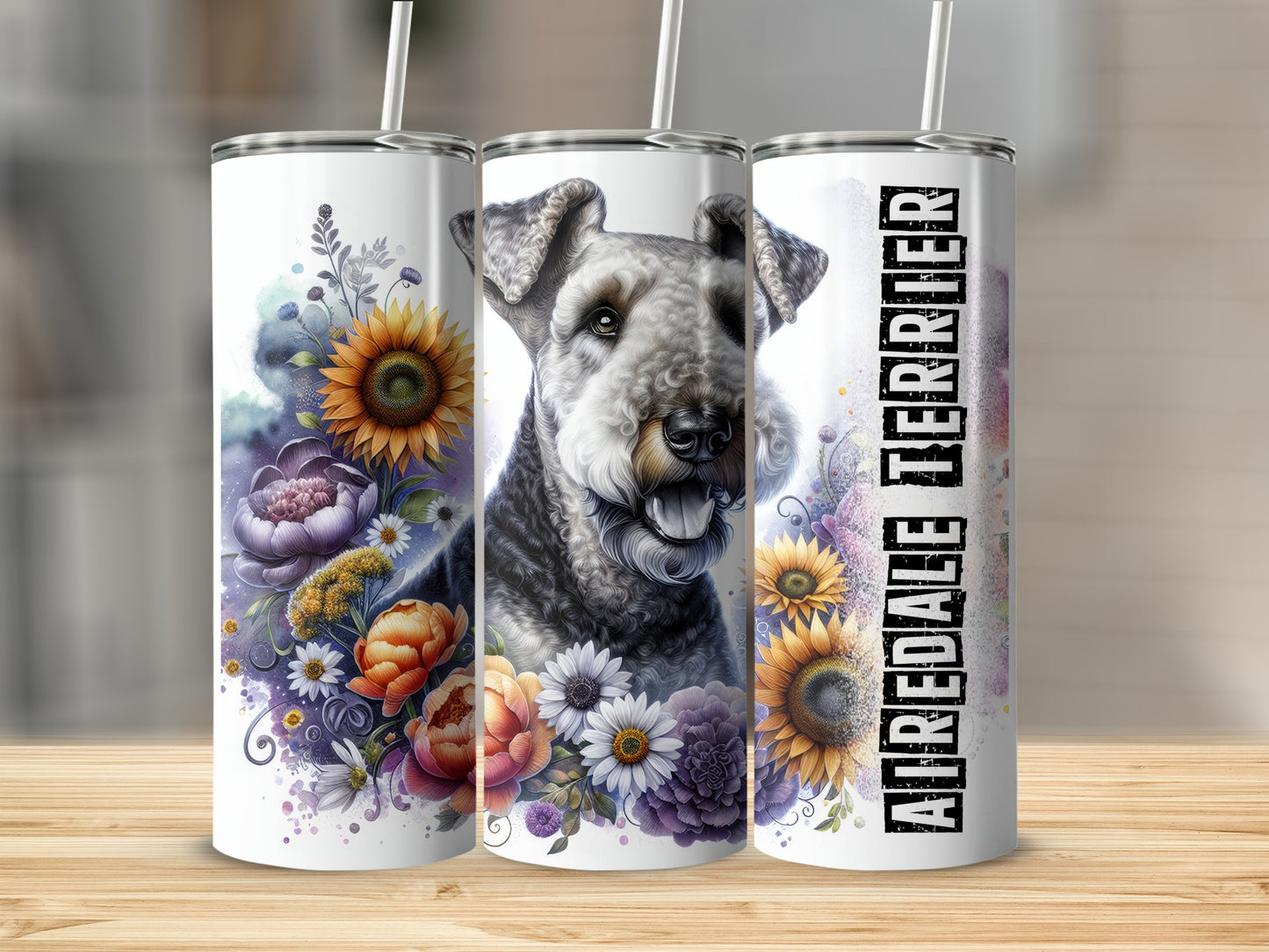 Three tumblers with an Airedale Terrier and floral designs.