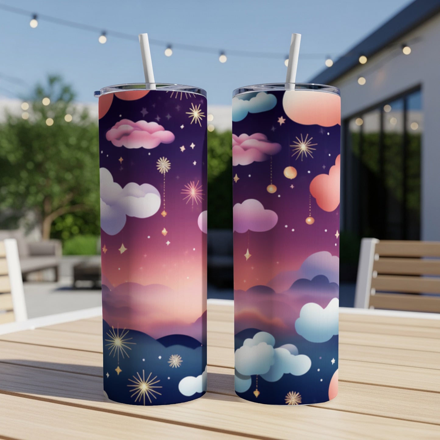 Two tall tumblers with a starry night sky and cloud design.