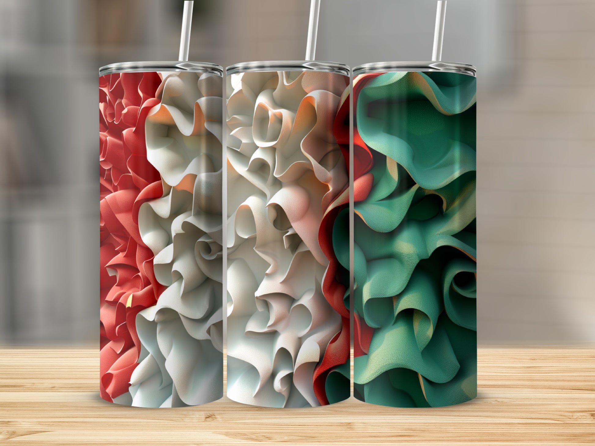 Three tumblers with ruffled patterns in red, white, and green designs.
