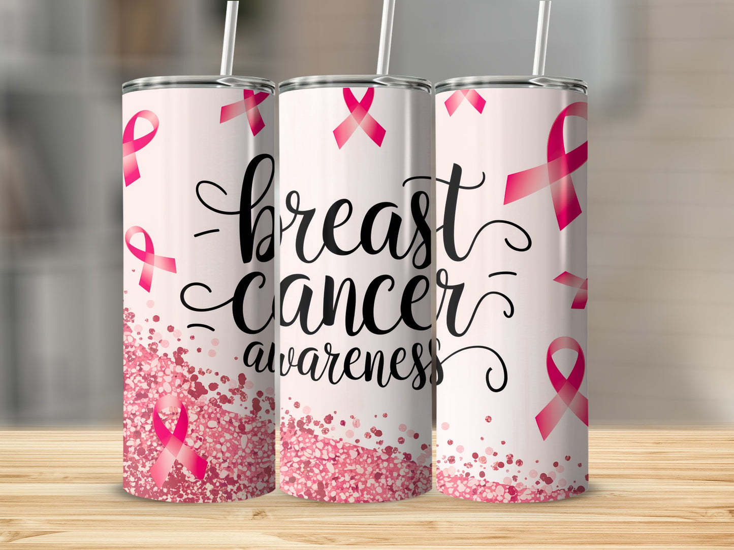 Three pink tumblers with "breast cancer awareness" and pink ribbons.