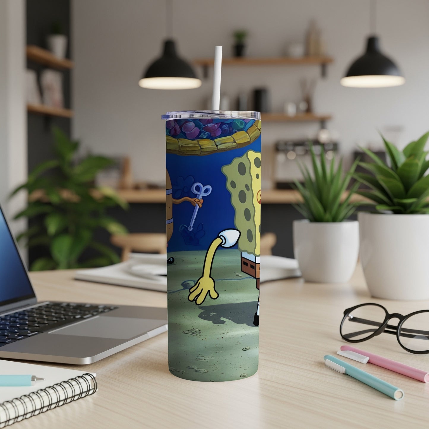 SpongeBob SquarePants cartoon character holding a spatula on a tumbler.