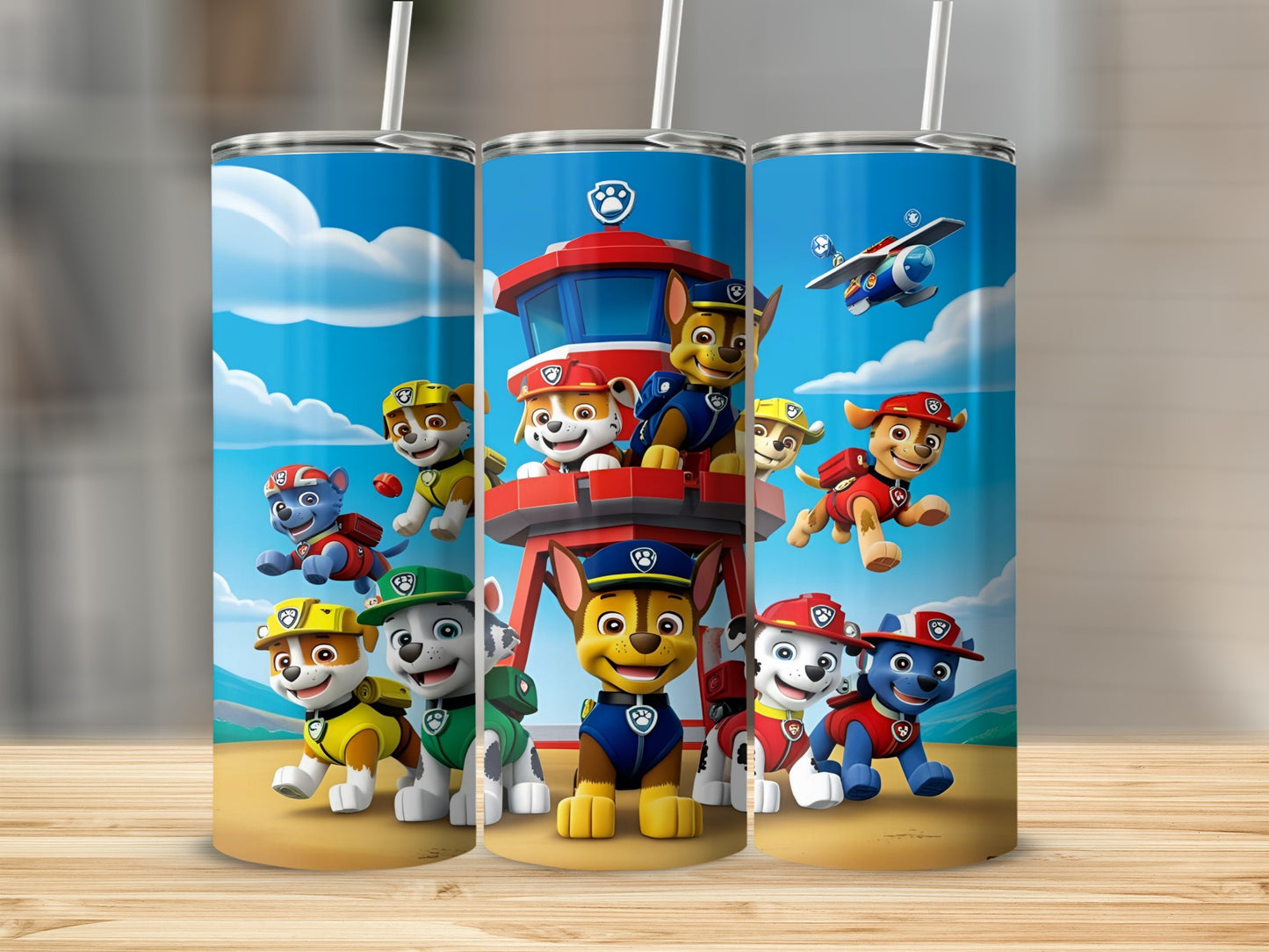 Paw Patrol characters on a beach with a lifeguard tower and blue sky.