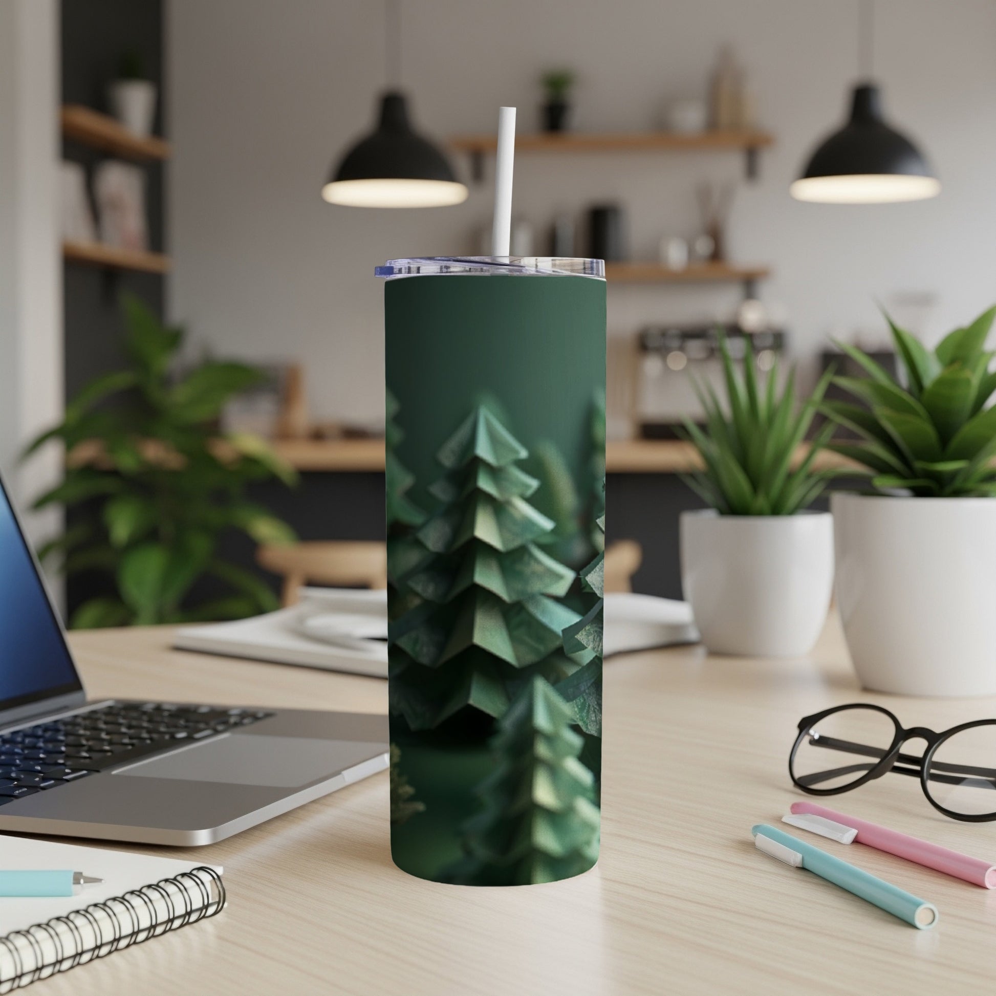 Green tumbler with repeating abstract forest tree pattern.